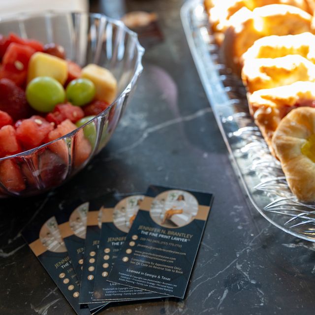 Refreshments and business cards at the welcome table.